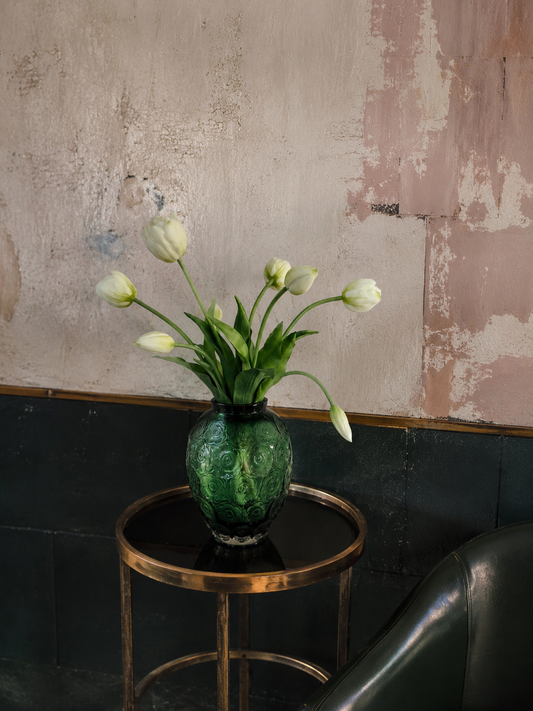 PO003 floral object in a green glass vessel